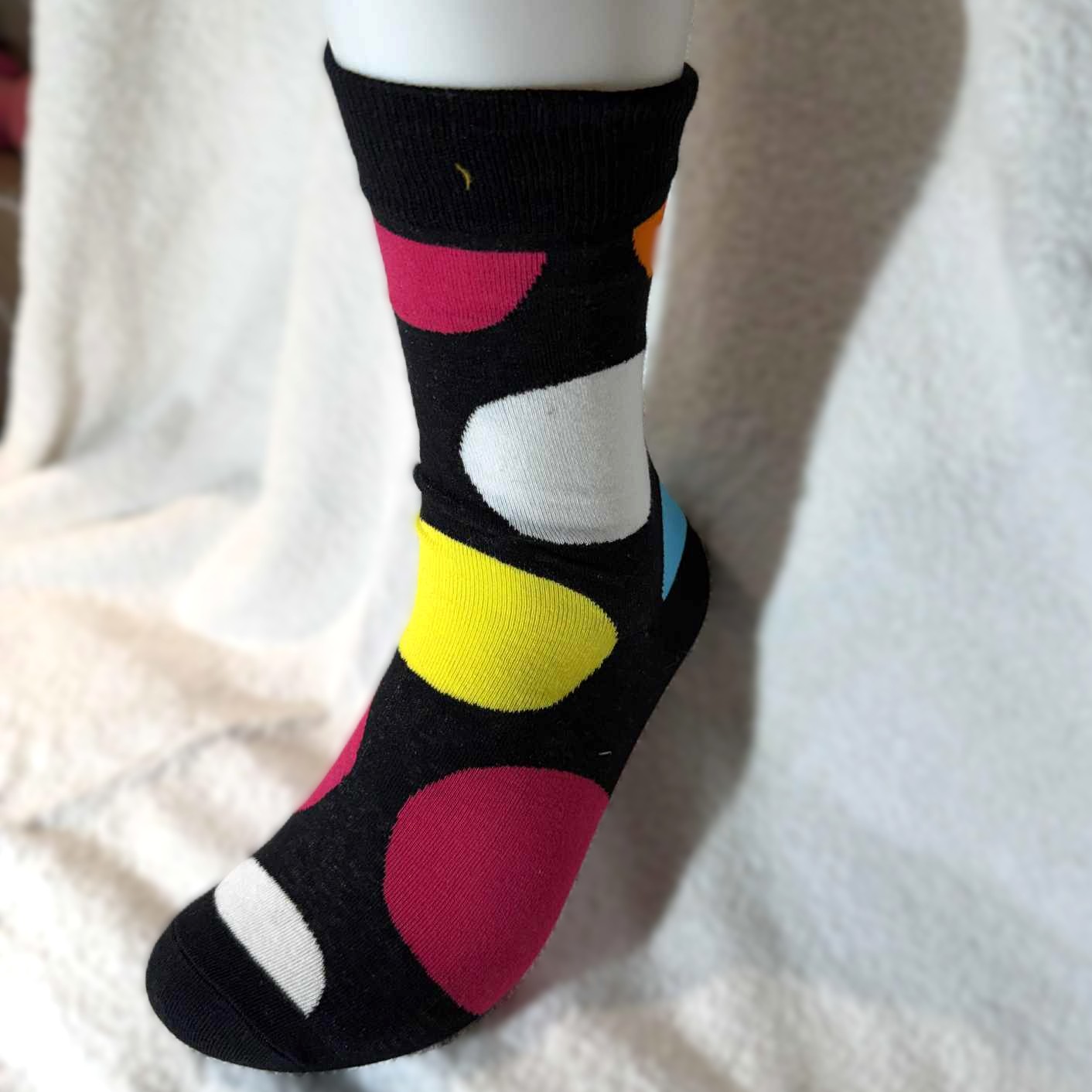 Sokk med sirkler i farger